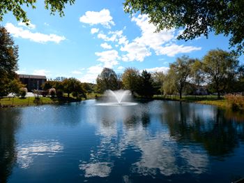 Beautiful Pond With Fountain at Woodsdale Apartments, Maryland